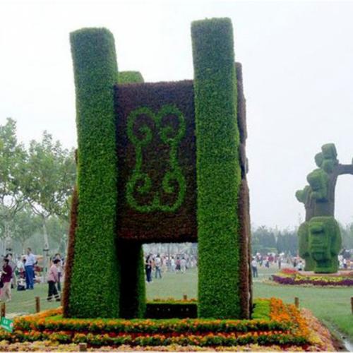 东莞华亦彩景观定制仿真绿雕工艺卡通动漫人物大型动物园林绿植雕塑